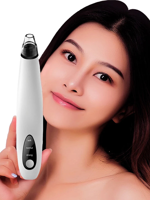Woman holding a white electronic device with a black tip, likely a skincare tool.